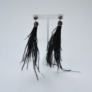 Feather earring with black stones